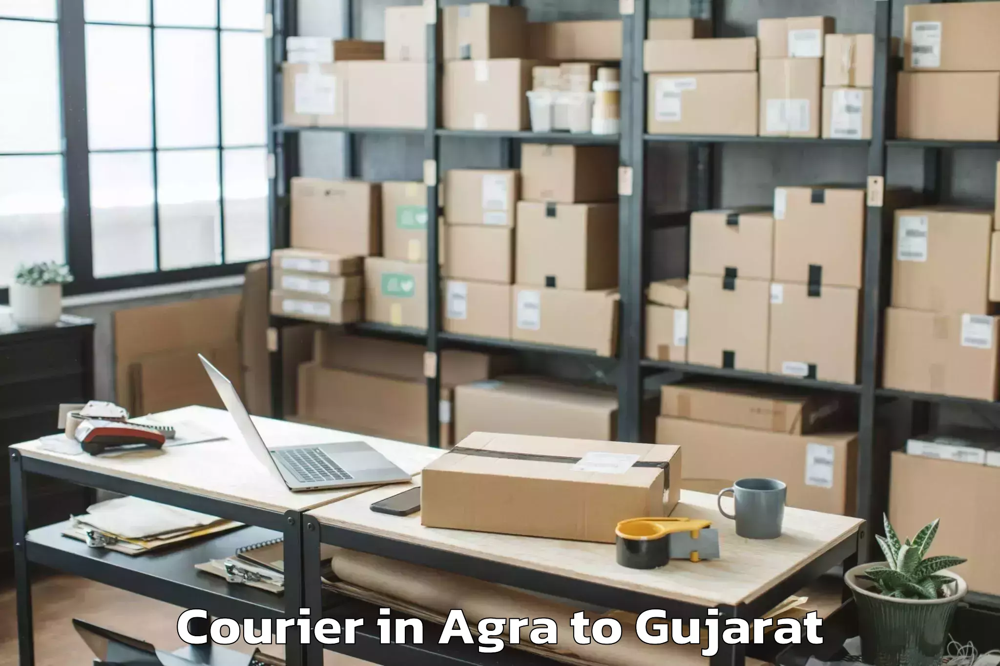 Agra to Kadi Courier Booking